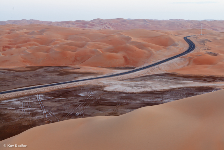 For example, I made it a mission that one day during my stay I was going to try and capture this road from a point that could show it against the vastness of the desert, so I drove around until I could find the highest dune and then walked up in the searing heat and humidity to be able to capture this photograph.