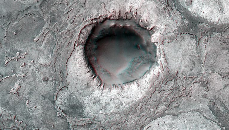 This NASA anaglyph lets you peer right into this Martian crater